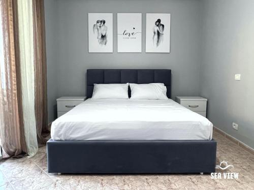 Llit o llits en una habitació de Sea View Apartaments