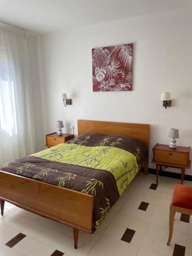 Ένα ή περισσότερα κρεβάτια σε δωμάτιο στο Appartement proche du canal du midi