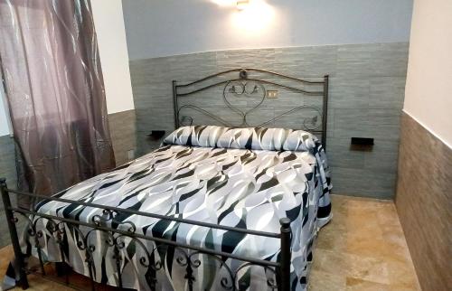 A bed or beds in a room at Stadium Apartament