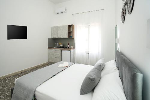 Postel nebo postele na pokoji v ubytování Meraviglia d'Otranto