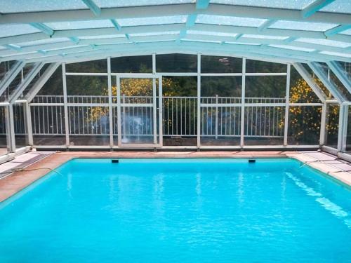 Bazén v ubytování Maison de 2 chambres avec piscine partagee jardin amenage et wifi a La Roche sur le Buis nebo v jeho okolí