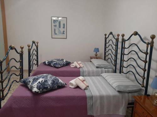 Postel nebo postele na pokoji v ubytování interno13bari