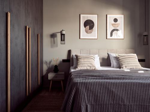 Una cama o camas en una habitación de Noema Villa - Stylish Villa with Scenic Serenity, by ZanteWize