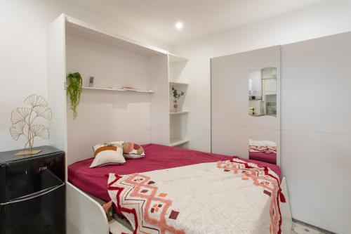 Posteľ alebo postele v izbe v ubytovaní Cannes Hyper Centre climatisé
