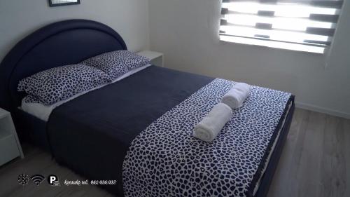 Postel nebo postele na pokoji v ubytování Vila Perla