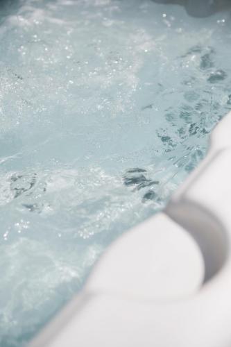 a close up of water in a swimming pool at Large Country House with Hot Tub, Pool Table, and Log Burner in Three Legged Cross