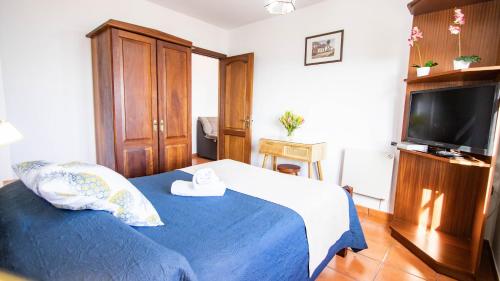 Postel nebo postele na pokoji v ubytování HolidaynorthTenerife Caserío Rural Los Charcos