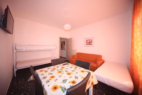 Ένα ή περισσότερα κρεβάτια σε δωμάτιο στο Appartamento Frontemare