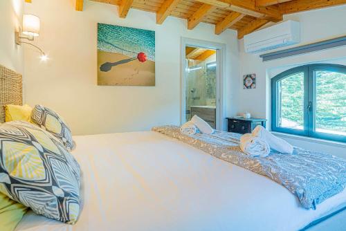 Ένα ή περισσότερα κρεβάτια σε δωμάτιο στο Villa Jade