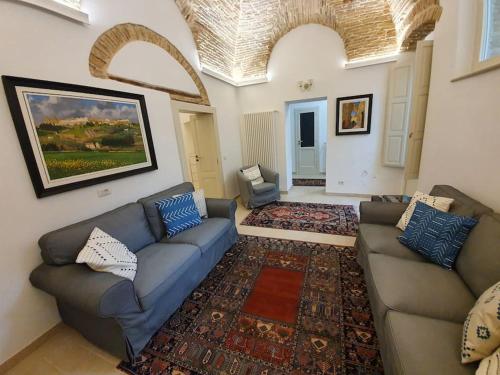 A seating area at Casa Santa Maria - Beautifully restored house in centro storico Irsina Basilicata Puglia