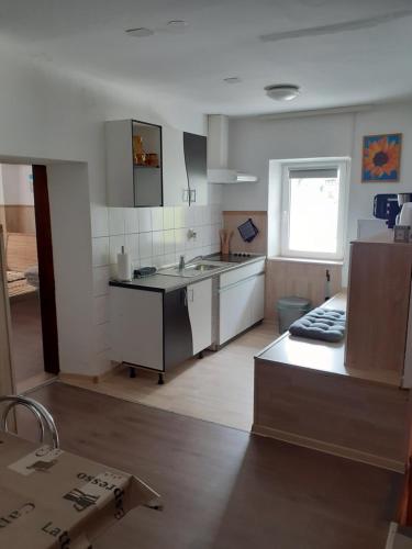 Kuchyň nebo kuchyňský kout v ubytování Zirnberg Appartements