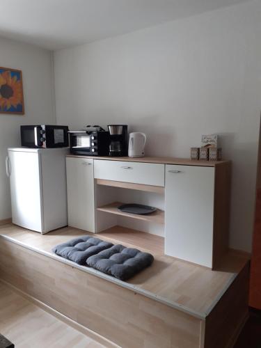 Kuchyň nebo kuchyňský kout v ubytování Zirnberg Appartements
