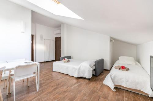 Ένα ή περισσότερα κρεβάτια σε δωμάτιο στο Alessia's Flat - Affori