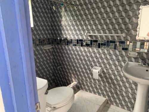 Un baño de Robin Hood Guest House