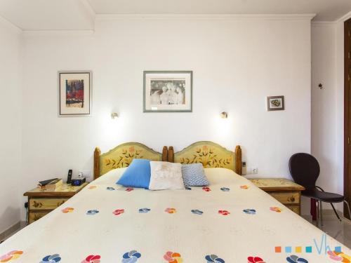 a bedroom with a large bed in a room at VH CostaBlanca - FONDA in Casas de Torrat