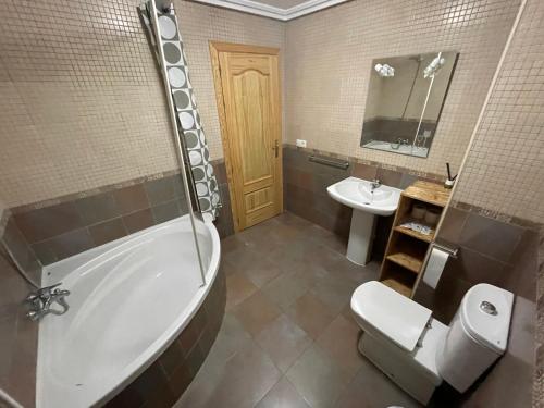 Kylpyhuone majoituspaikassa Hostal Las Palomas