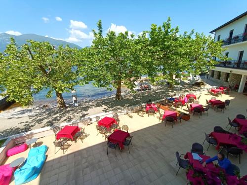 an overhead view of a patio with tables and chairs at Hotel S.Maria in Brenzone sul Garda