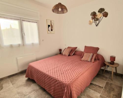 Posteľ alebo postele v izbe v ubytovaní Petite maison en pierre