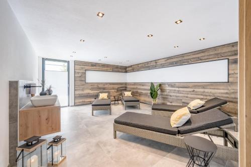 a living room with a couch and a table at Mountain Moments in Sautens