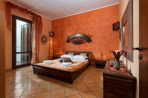 Een bed of bedden in een kamer bij I Tre Golfi - Appartamenti a 800 mt dal centro