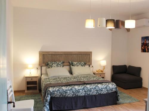 Postel nebo postele na pokoji v ubytování Agriturismo Il Broletto