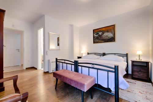 Ένα ή περισσότερα κρεβάτια σε δωμάτιο στο Villa Luči