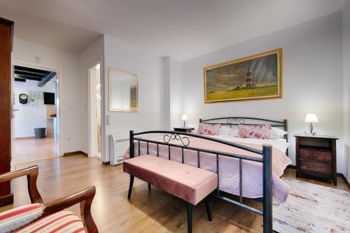 Katil atau katil-katil dalam bilik di Villa Luči