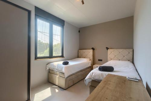 Posteľ alebo postele v izbe v ubytovaní Villa Grisi