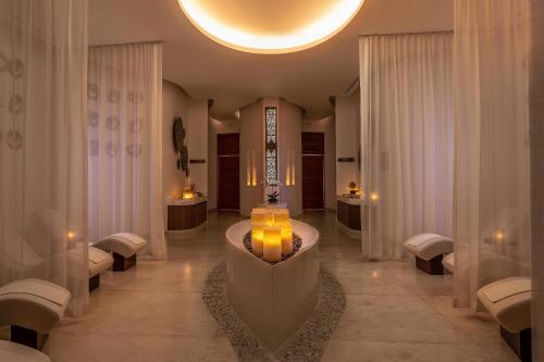 a lobby with a table with candles in it at Le Blanc Spa Resort Cancun Adults Only All-Inclusive in Cancún