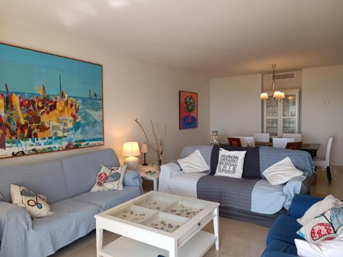 Posezení v ubytování Amplio apartamento en Portofino Alcaidesa
