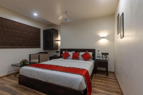 Postel nebo postele na pokoji v ubytování Divan Clarks Inn Goa