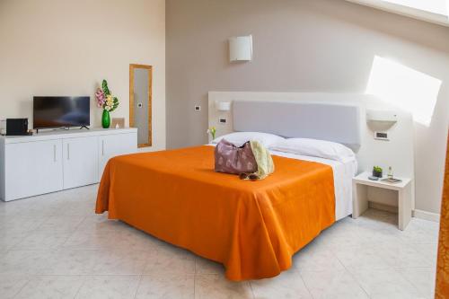 Katil atau katil-katil dalam bilik di Diano Sporting Apartments