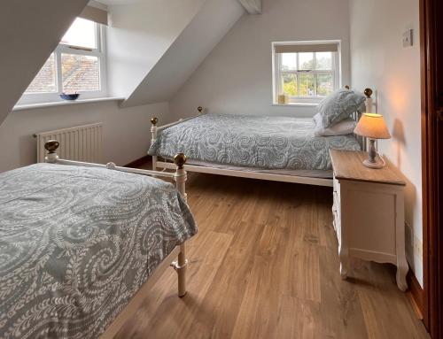 Кровать или кровати в номере Campden Place - 2 Bed Home in Central Chipping Campden