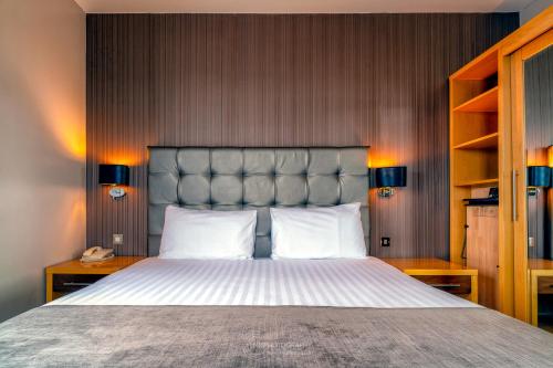 Letto o letti in una camera di City Hotel