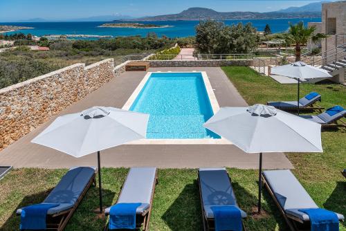 A view of the pool at Elios Villas or nearby