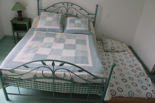 Una cama o camas en una habitación de Auberg'IN !