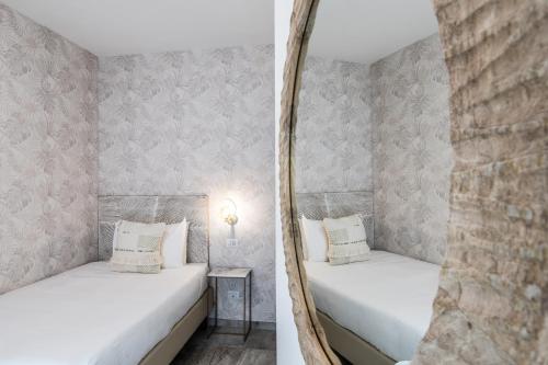 Hotel Brenneroにあるベッド