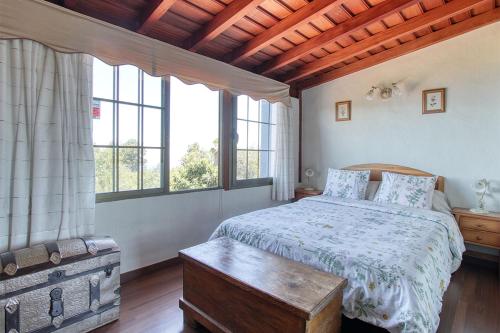 Posteľ alebo postele v izbe v ubytovaní Casa Rosales with Pool & Wifi