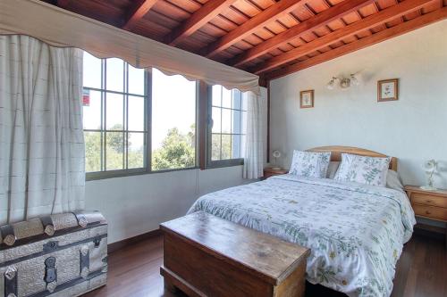 Ένα ή περισσότερα κρεβάτια σε δωμάτιο στο Casa Rosales