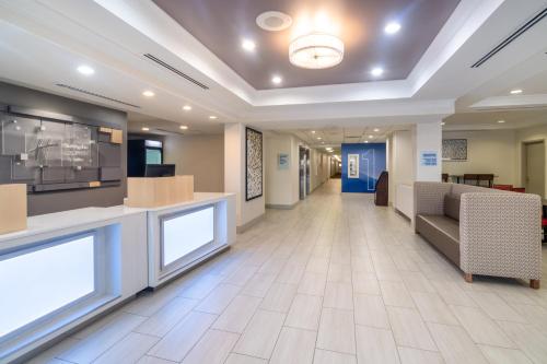 a lobby of a hospital with a waiting room at Holiday Inn Express Hotel & Suites Bluffton at Hilton Head Area by IHG in Bluffton