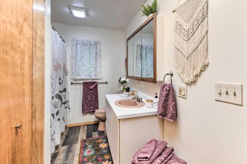 A bathroom at Juneau Apartment - Walk to Hiking and Breweries