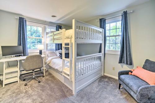 a bedroom with a bunk bed and a desk at Family-Friendly Retreat with Hot Tub 1 Mi to Dtwn in Saratoga Springs