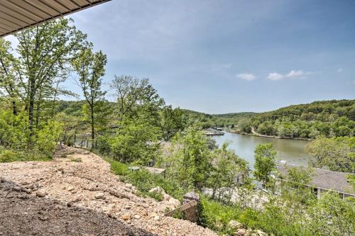 a view of a river from a house at Grill and Fire Pit Blue Cabin Ozarks Getaway! in Camdenton