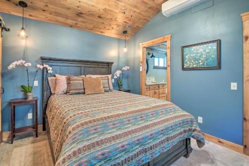 a bedroom with a bed and a wooden ceiling at Twin Palms Romantic Retreat Yard and Grill! in Simi Valley
