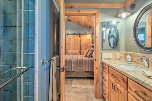 a bathroom with a shower and a sink and atained at Twin Palms Romantic Retreat Yard and Grill! in Simi Valley