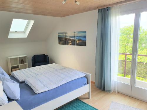 Postel nebo postele na pokoji v ubytování Ferienwohnung mit Ausblick