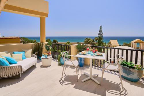 Honeymoon Corner Suite, sun-all-day terrace on the best beach of Marbella