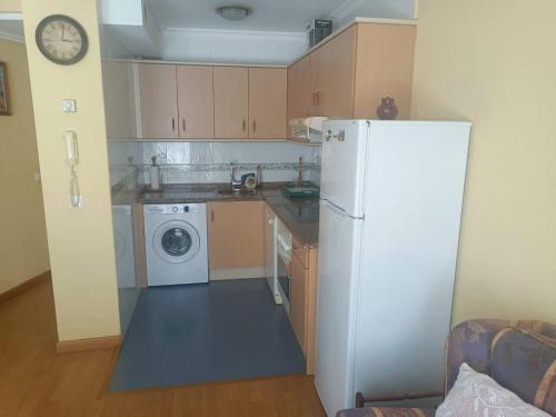 Virtuvė arba virtuvėlė apgyvendinimo įstaigoje Apartamento Jardin del Sueve