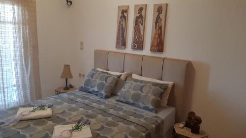 Кровать или кровати в номере Filia Apartments