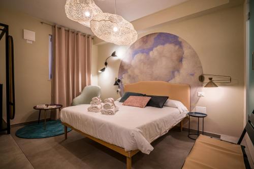 A bed or beds in a room at Cielo e Nuvole